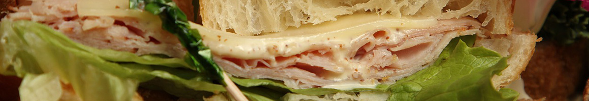 Eating Sandwich Cafe at Trio Cafe restaurant in Boston, MA.